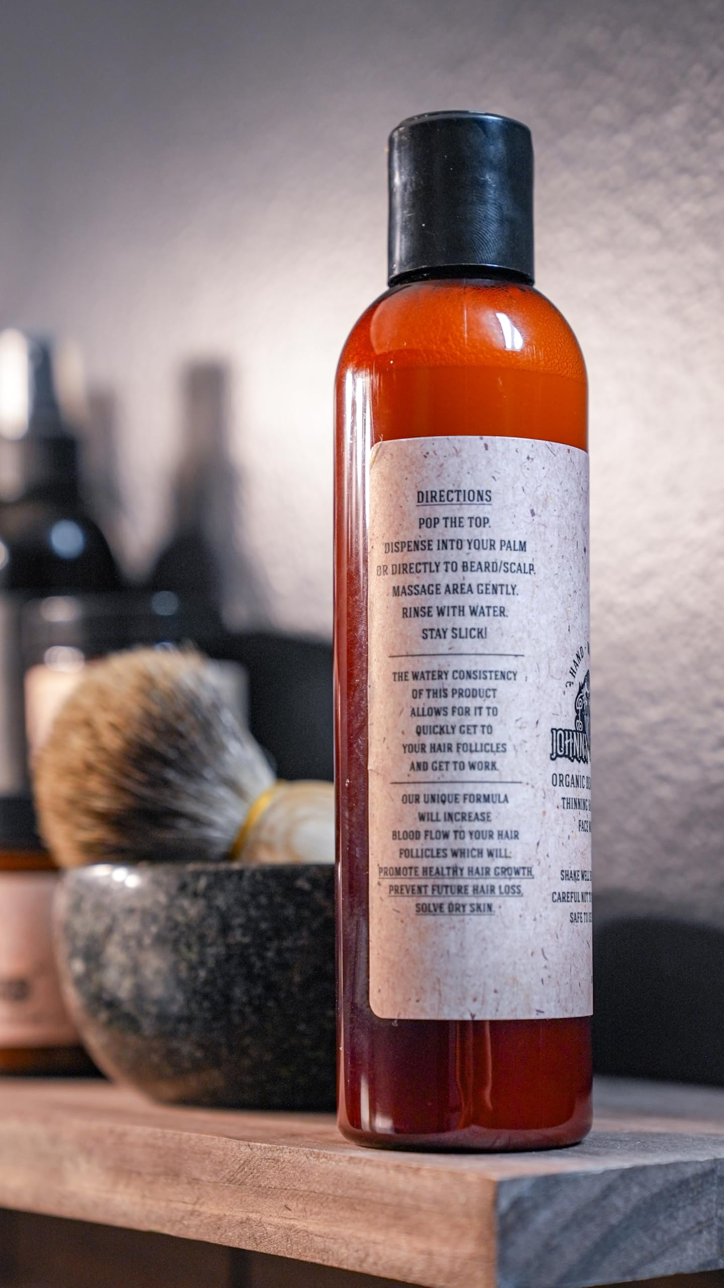Johnny Slicks label detail highlighting ingredients and natural benefit