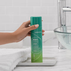 Joico Body Shake bottle detail highlighting stainless-steel ball technology for balanced spray