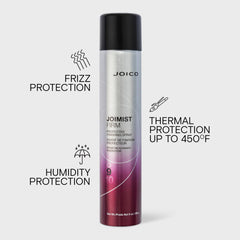 Hand holding Joico JoiMist Firm 9 fl oz to show scale and travel-friendly bottle advantage