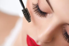JOLIE mascara on model illustrating natural navy definition and comfortable wear benefit