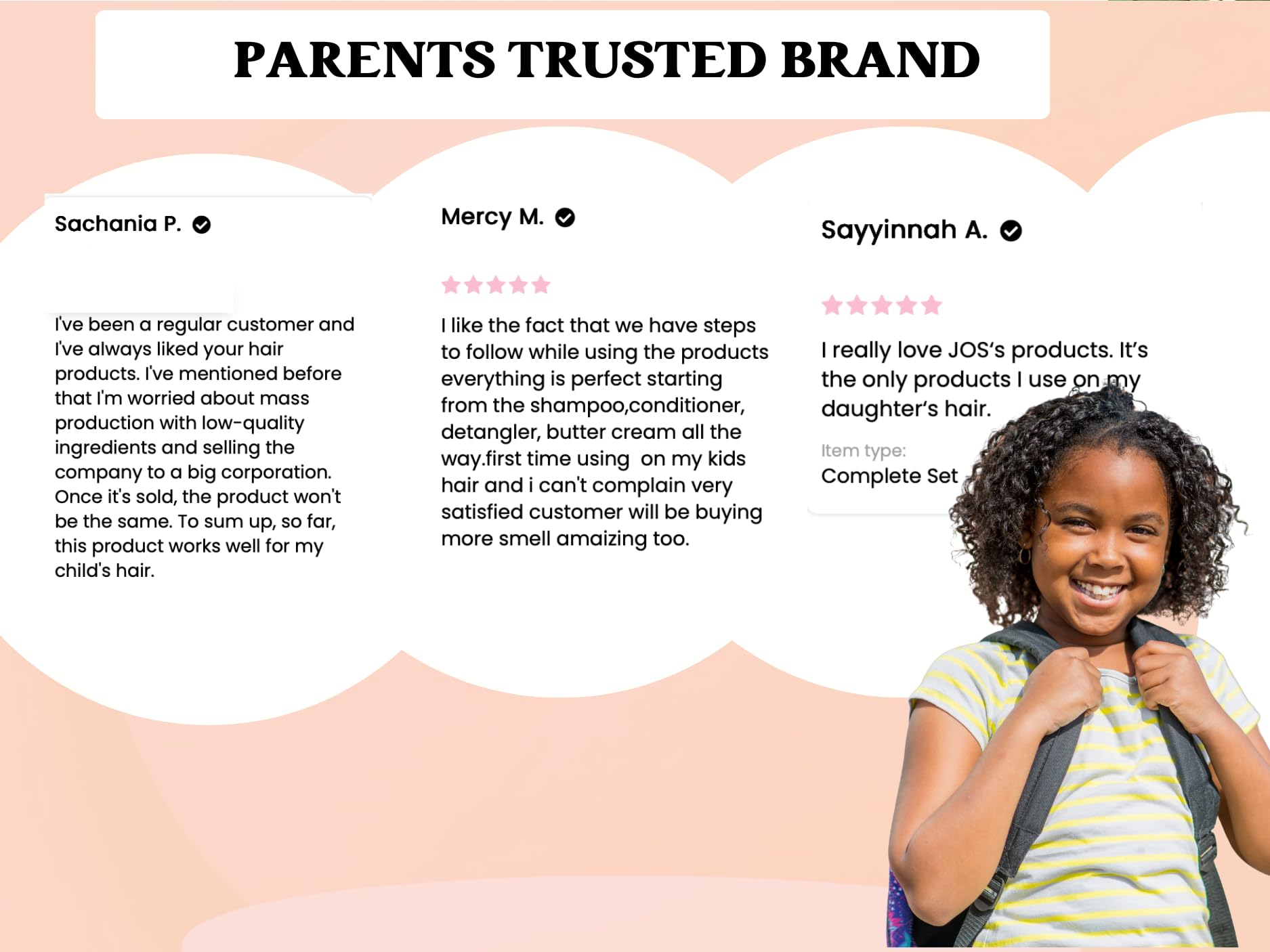 J'Organic Solutions child smiling with styled hair demonstrating soft healthy-looking hair