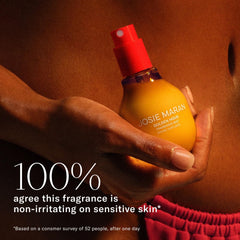 Josie Maran with argan nuts close-up highlighting organic argan oil nourishment