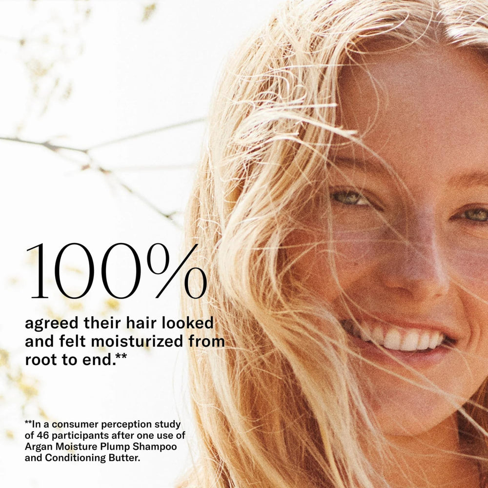 Josie Maran conditioner butter spread on finger shows rich conditioning benefit