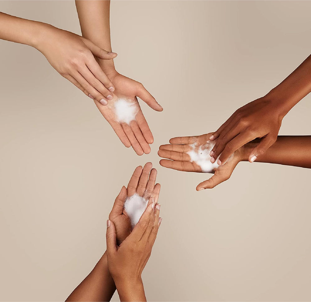 J.R. Watkins foam on hands demonstrating gentle cleansing benefit
