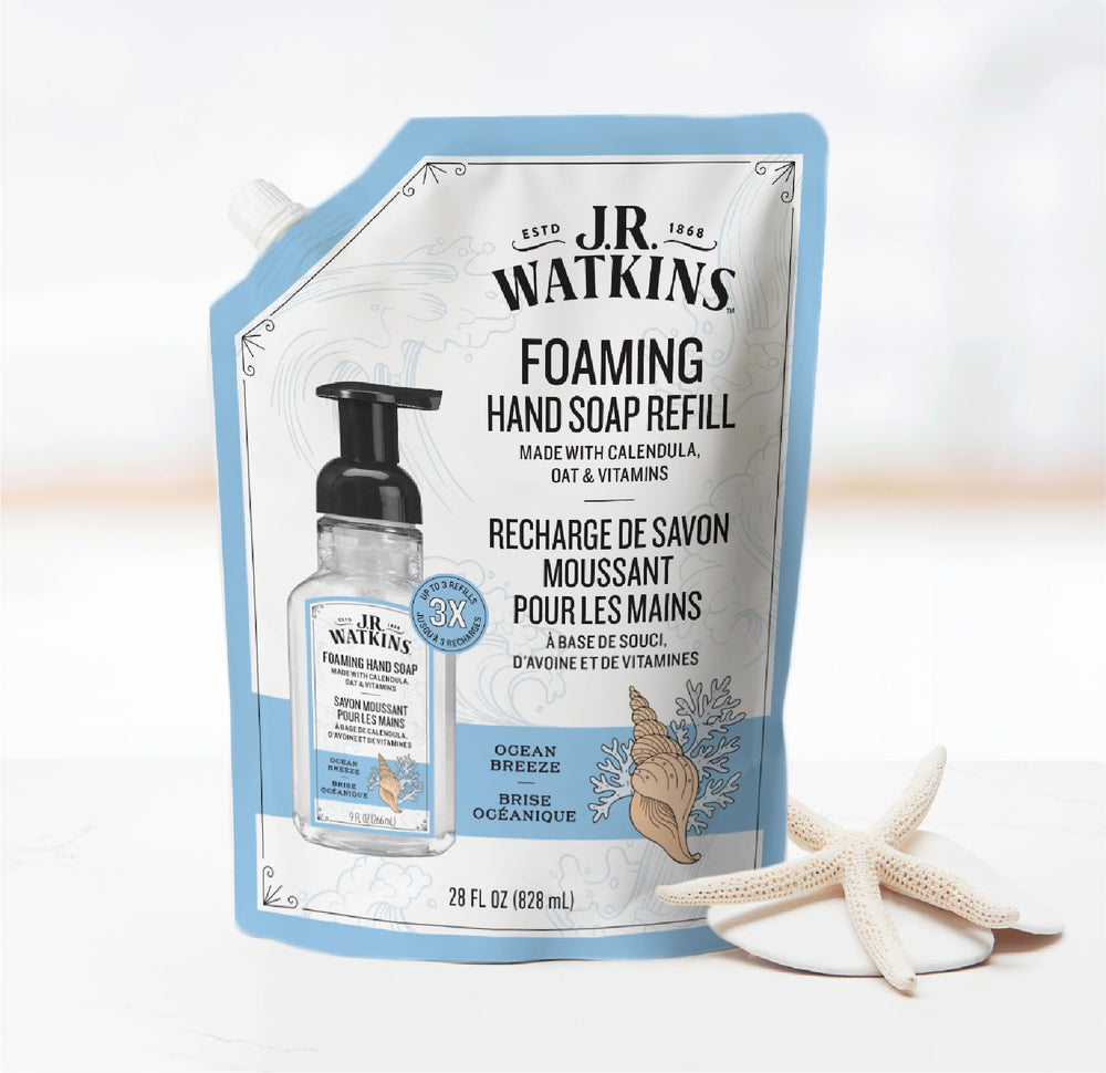 J.R. Watkins pouring refill into foaming bottle for easy use benefit