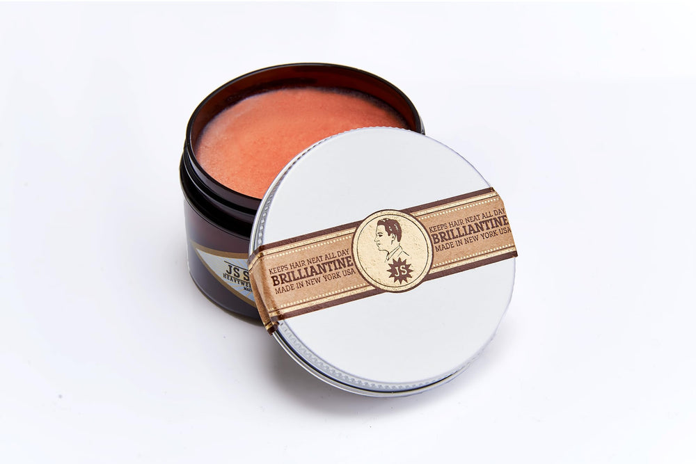 JS Sloane texture close-up revealing smooth pomade consistency and control