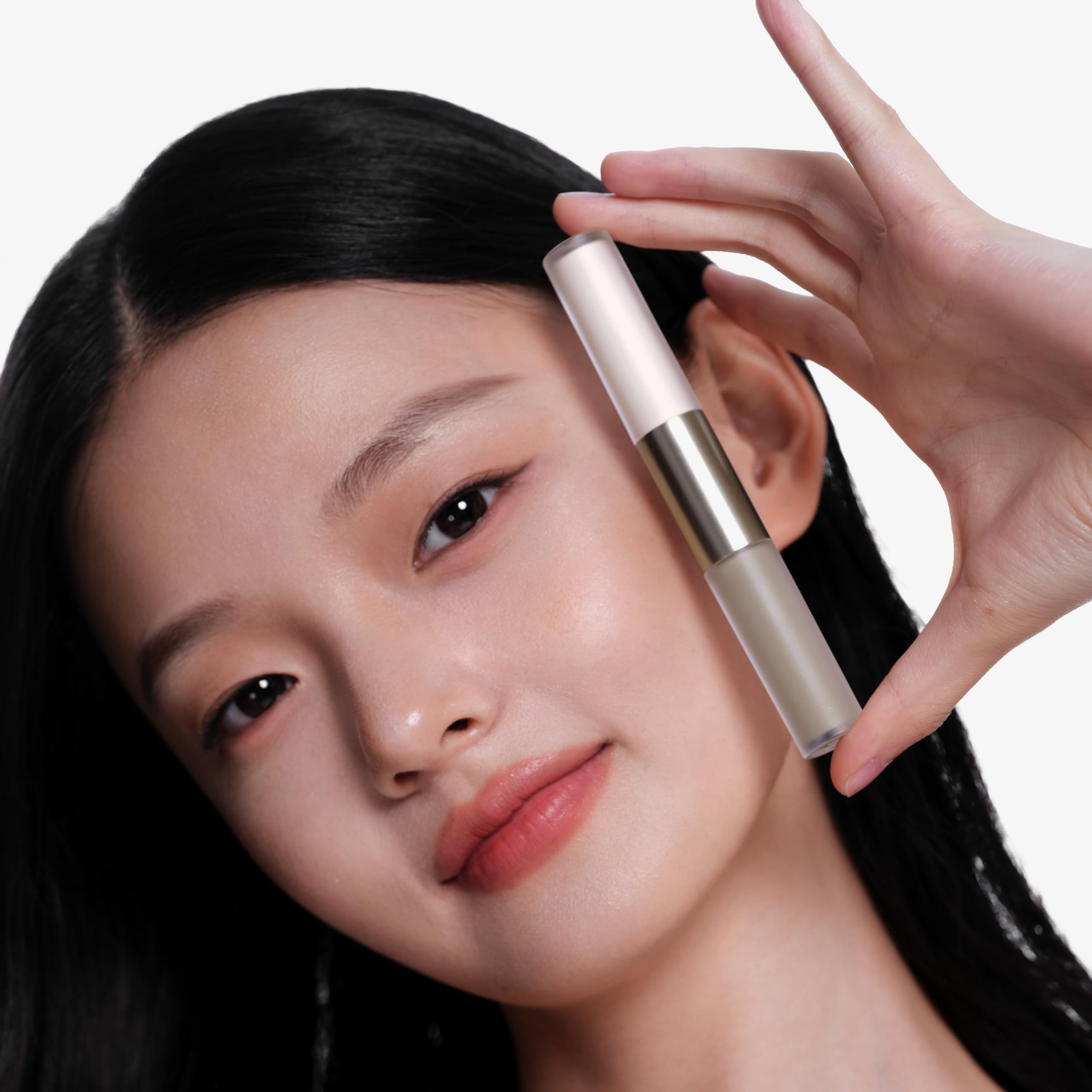 JUDYDOLL before-and-after portrait demonstrating subtle sculpting and improved brightness