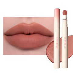 JUDYDOLL front packaging showing red matte tube and clear branding, professional presentation