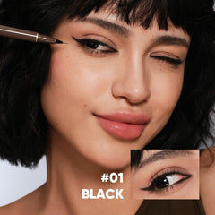 JUDYDOLL black ink stroke swatch showing smooth, high-pigment payoff