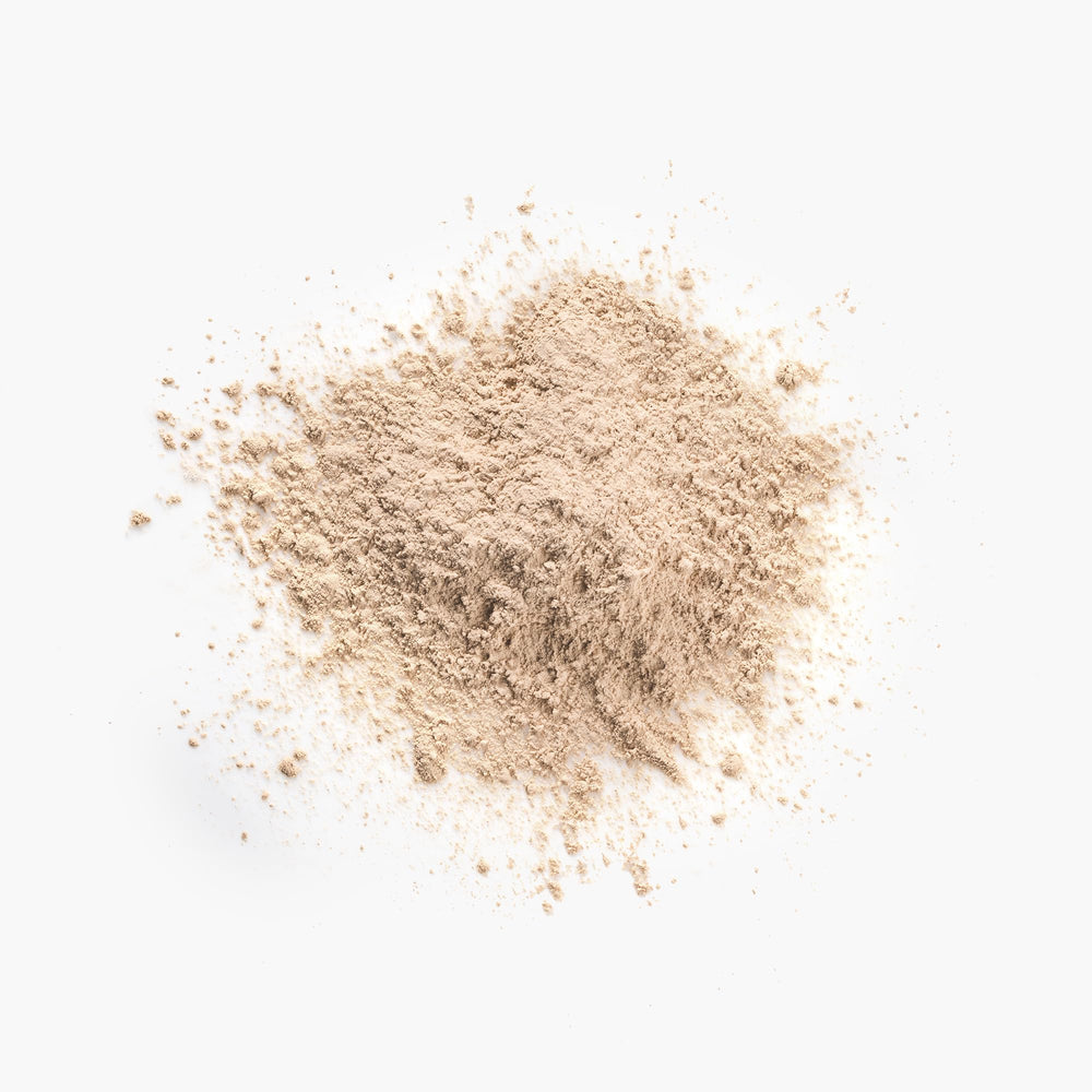 Juice Beauty powder texture close-up highlighting ultra-fine luminous particles