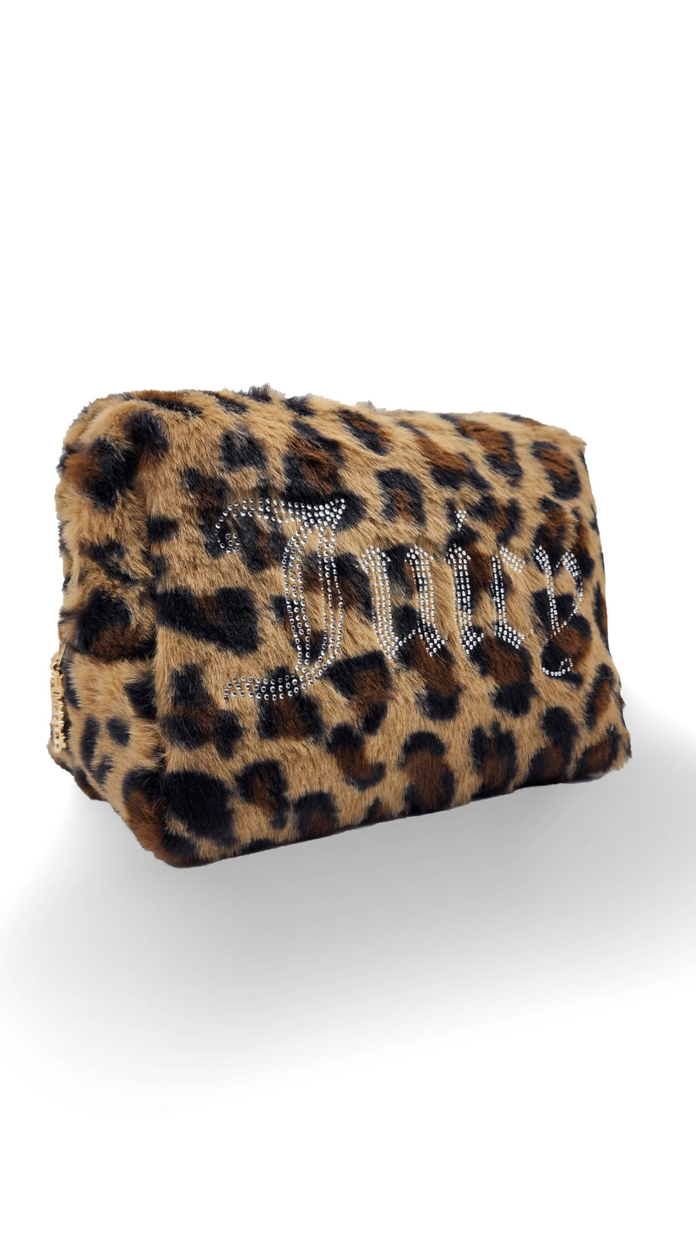 Juicy Couture open bag revealing wipe-clean lining and organized cosmetic storage