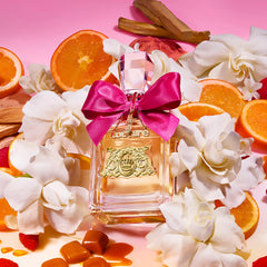 Juicy Couture cap and label close-up highlighting brand identity and quality