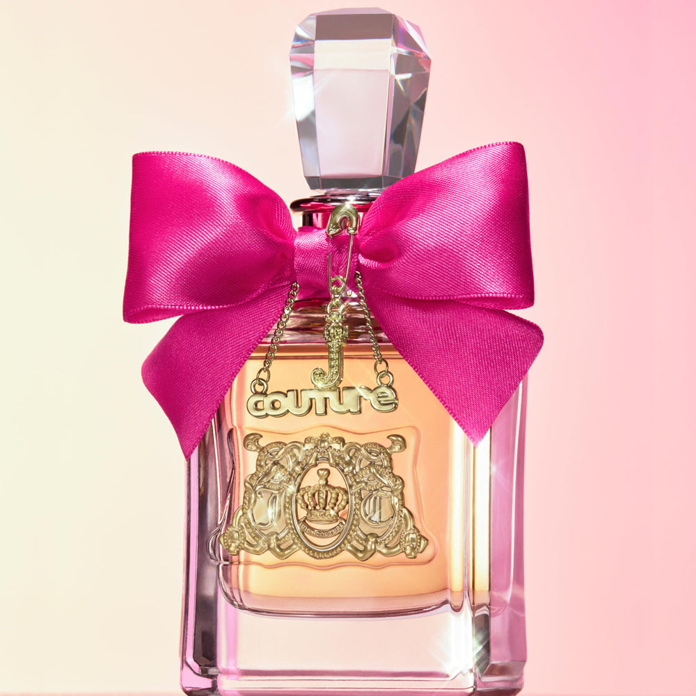 Juicy Couture spray on skin texture showing smooth absorption and glow