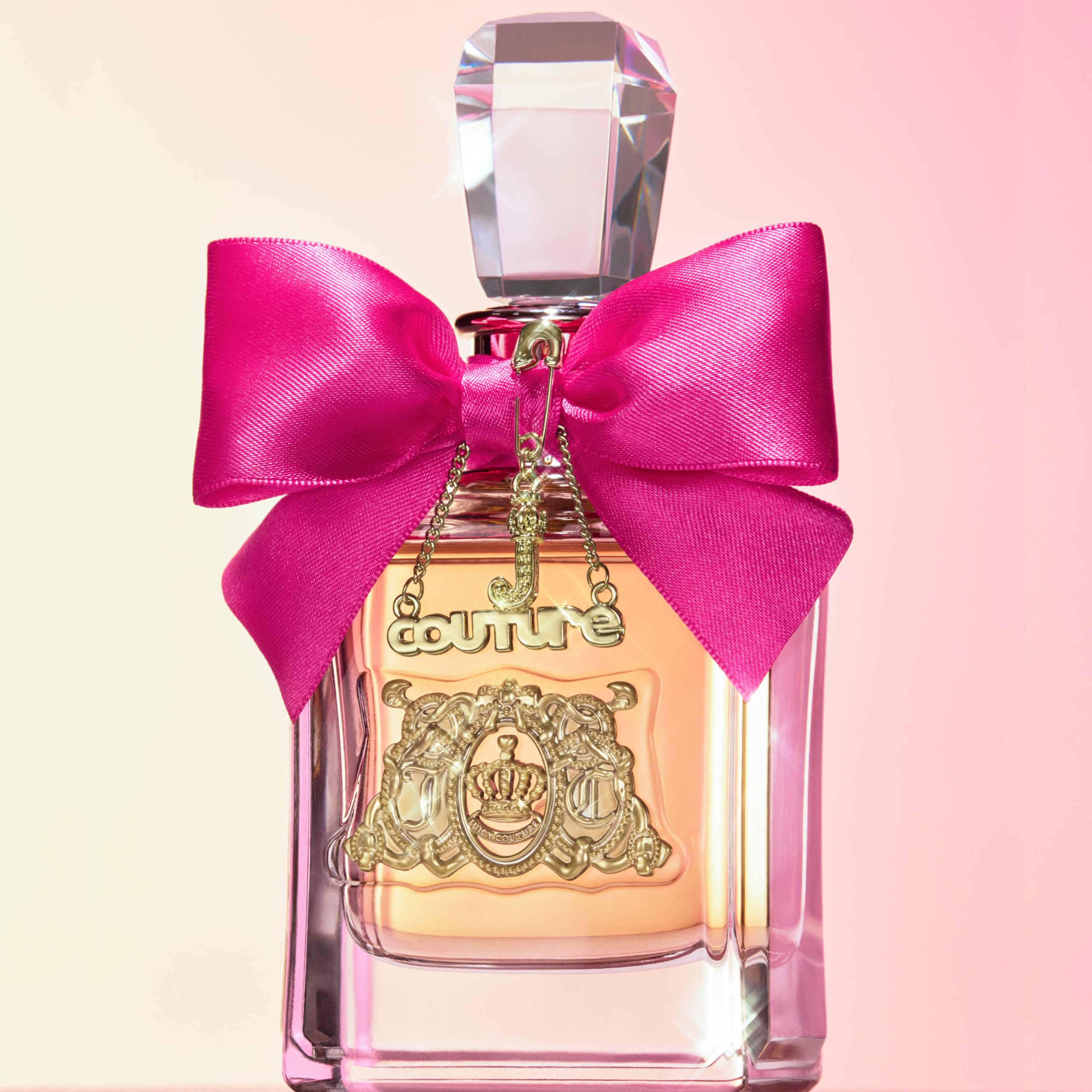 Juicy Couture Viva La Juicy tucked in purse demonstrating on-the-go refresh convenience