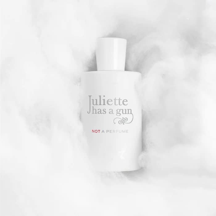 Juliette Has A Gun bottle held in hand for scale and everyday wearability