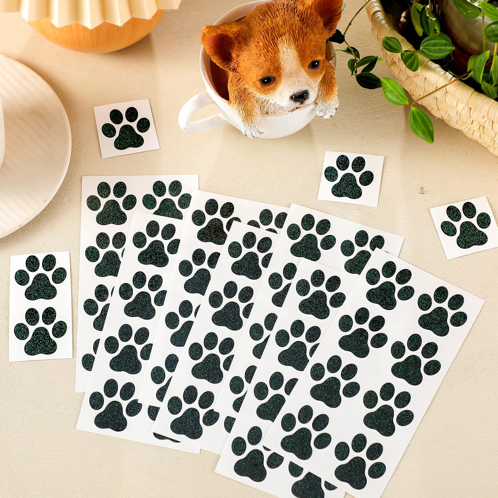 Jutom label and sheet layout displaying 8 paw prints per sheet for quantity clarity