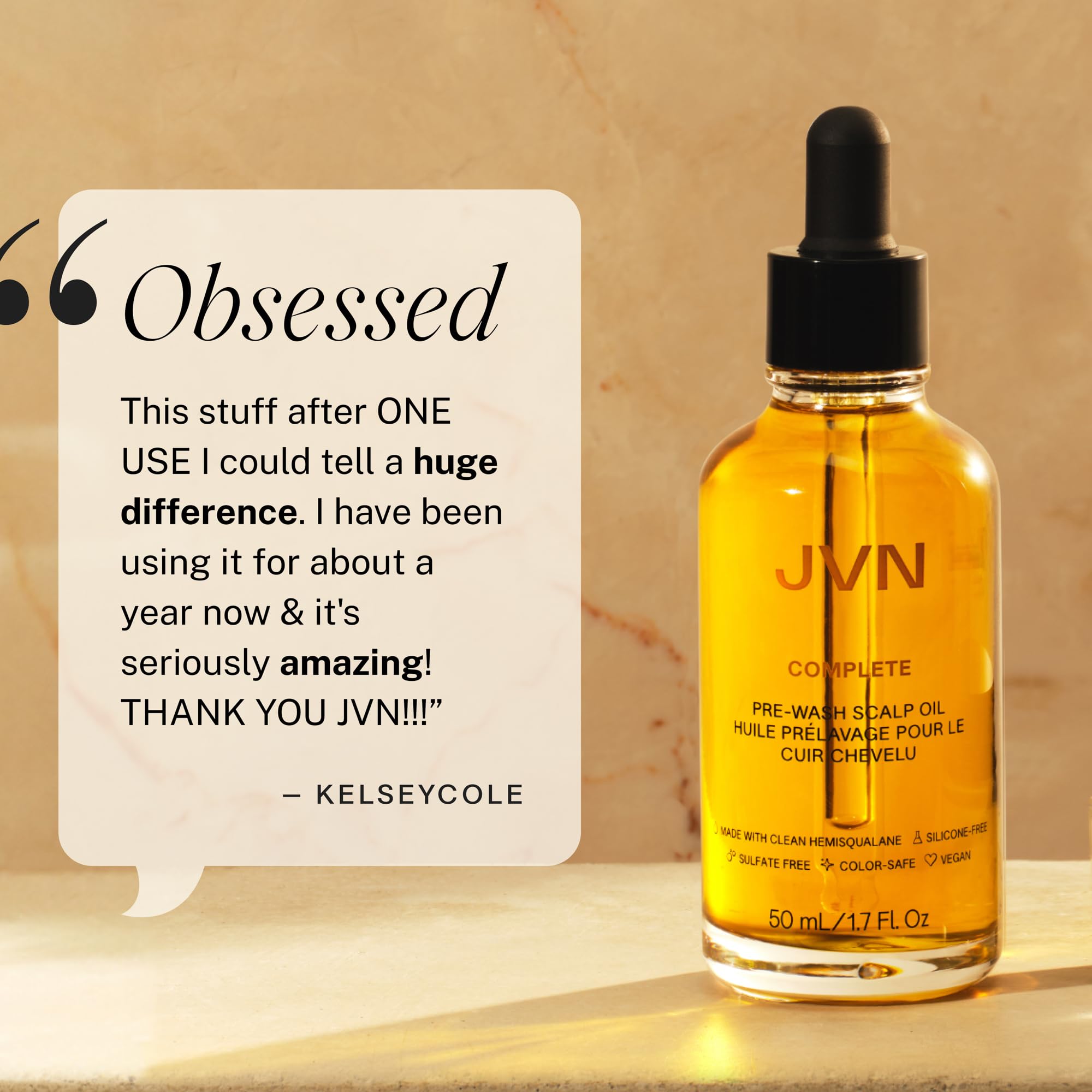JVN bottle next to everyday items showing compact 1.7 fl oz convenience