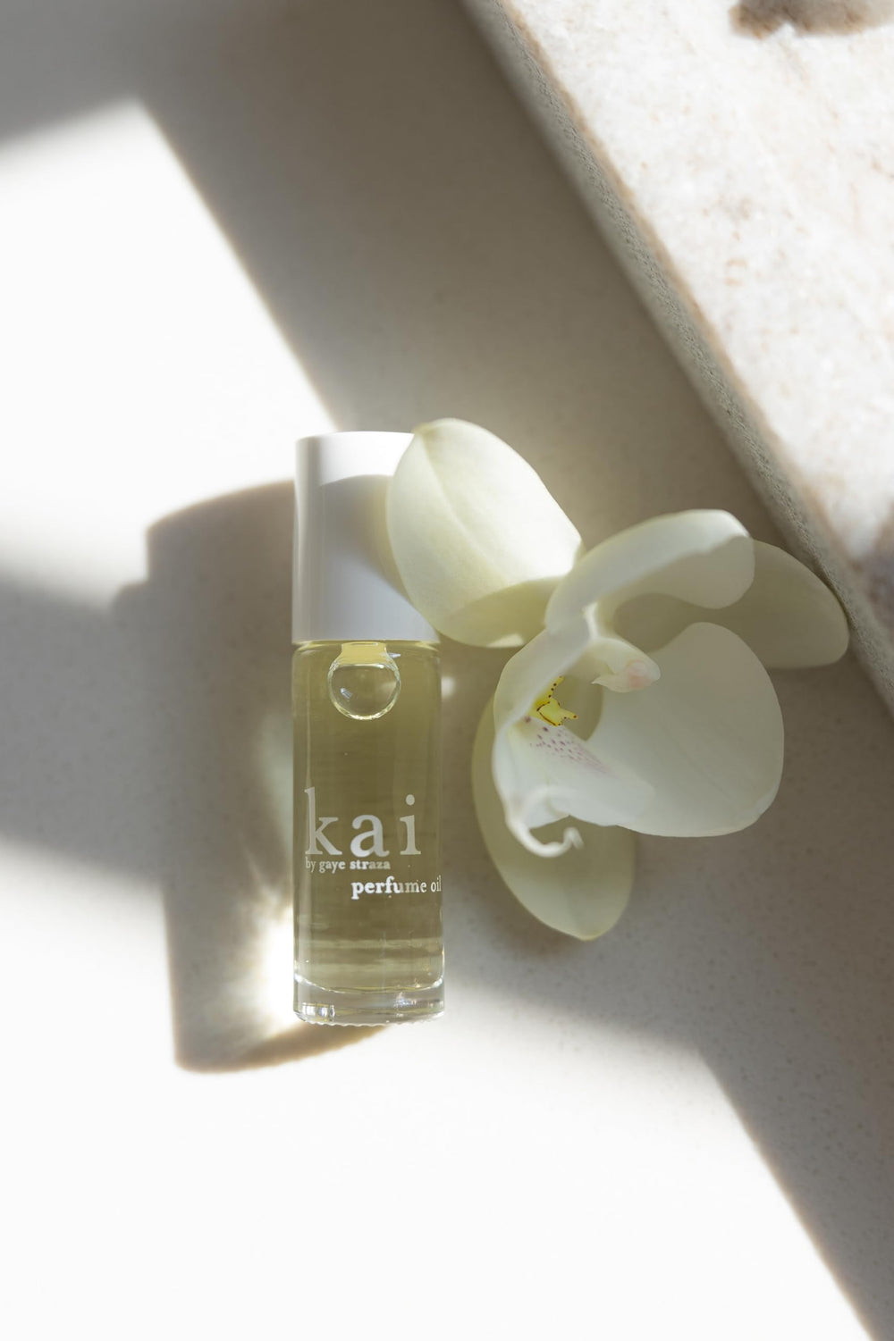 kai roll-on in purse lifestyle image showing easy portability and quick touch-ups