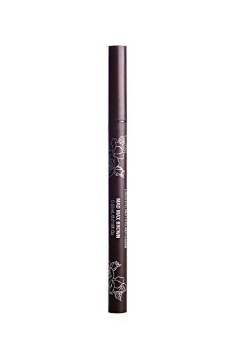 Kat Von D pencil next to coin showing scale and travel-friendly convenience