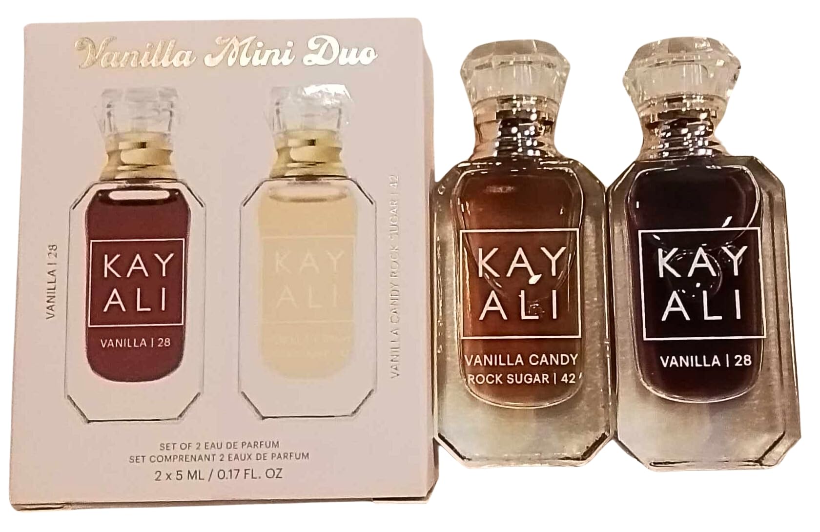 KAYALI Vanilla 28 bottle closeup showing creamy vanilla depth and luxe finish