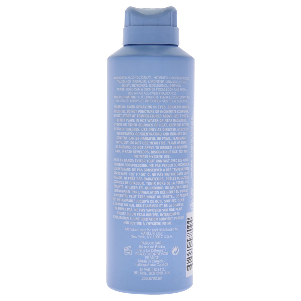 Kenneth Cole Blue sprayed on chest illustrating quick refresh and confidence