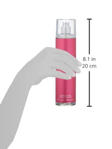 Kenneth Cole body mist on vanity among accessories suggesting daily elegance