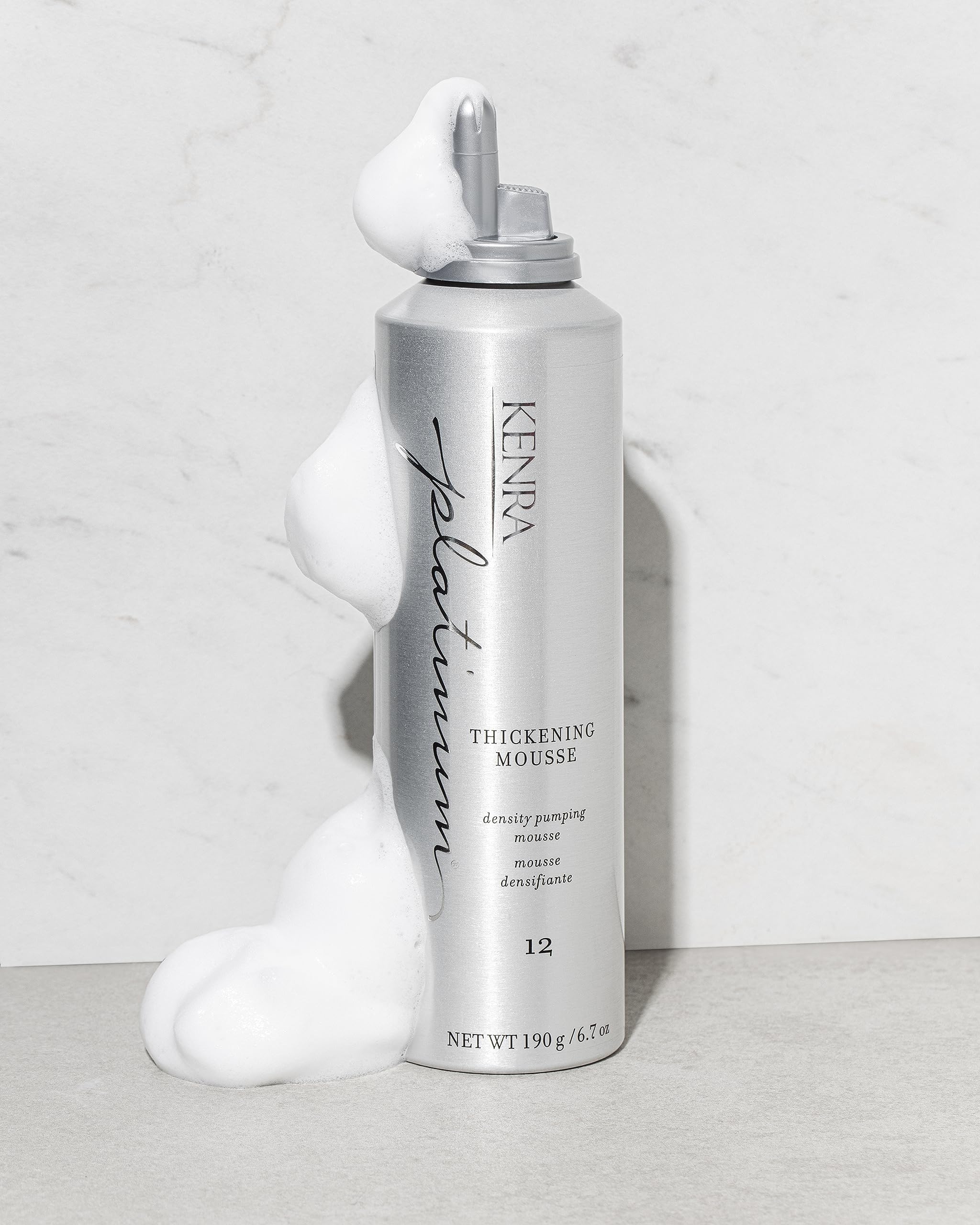 Kenra Platinum mousse creating root lift during blowdry for long-lasting body