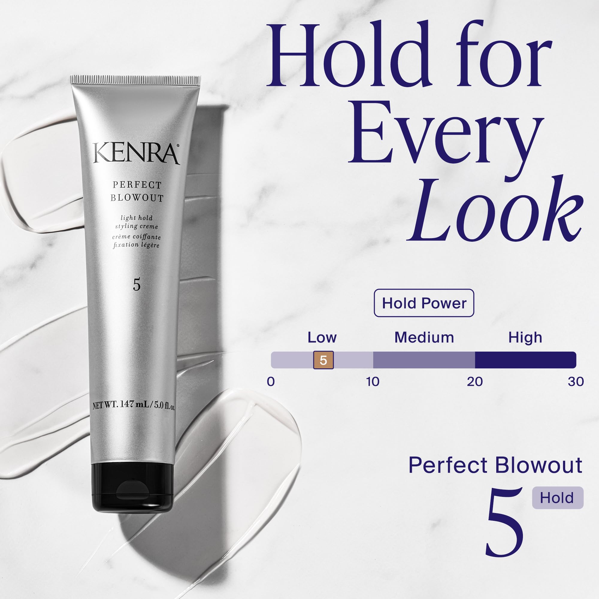 Kenra applying product to damp hair for heat protection and even coverage