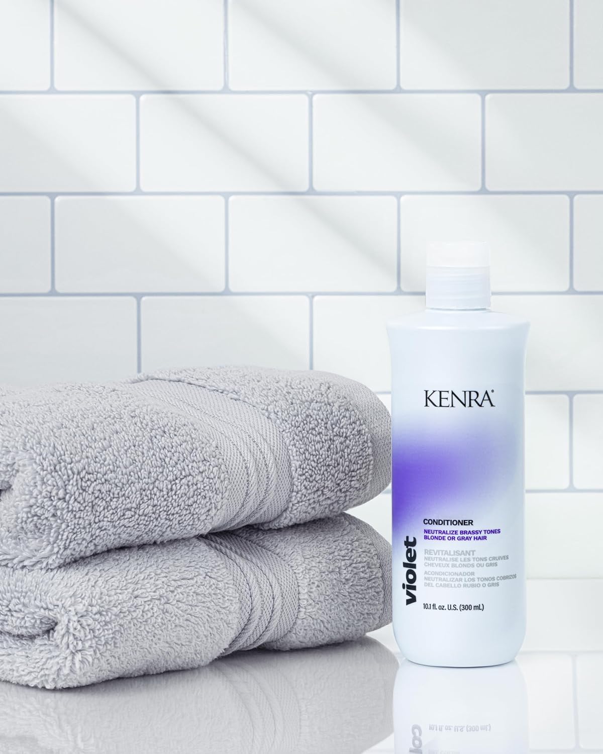 Kenra set staged in bathroom during routine to maintain cool blonde tones