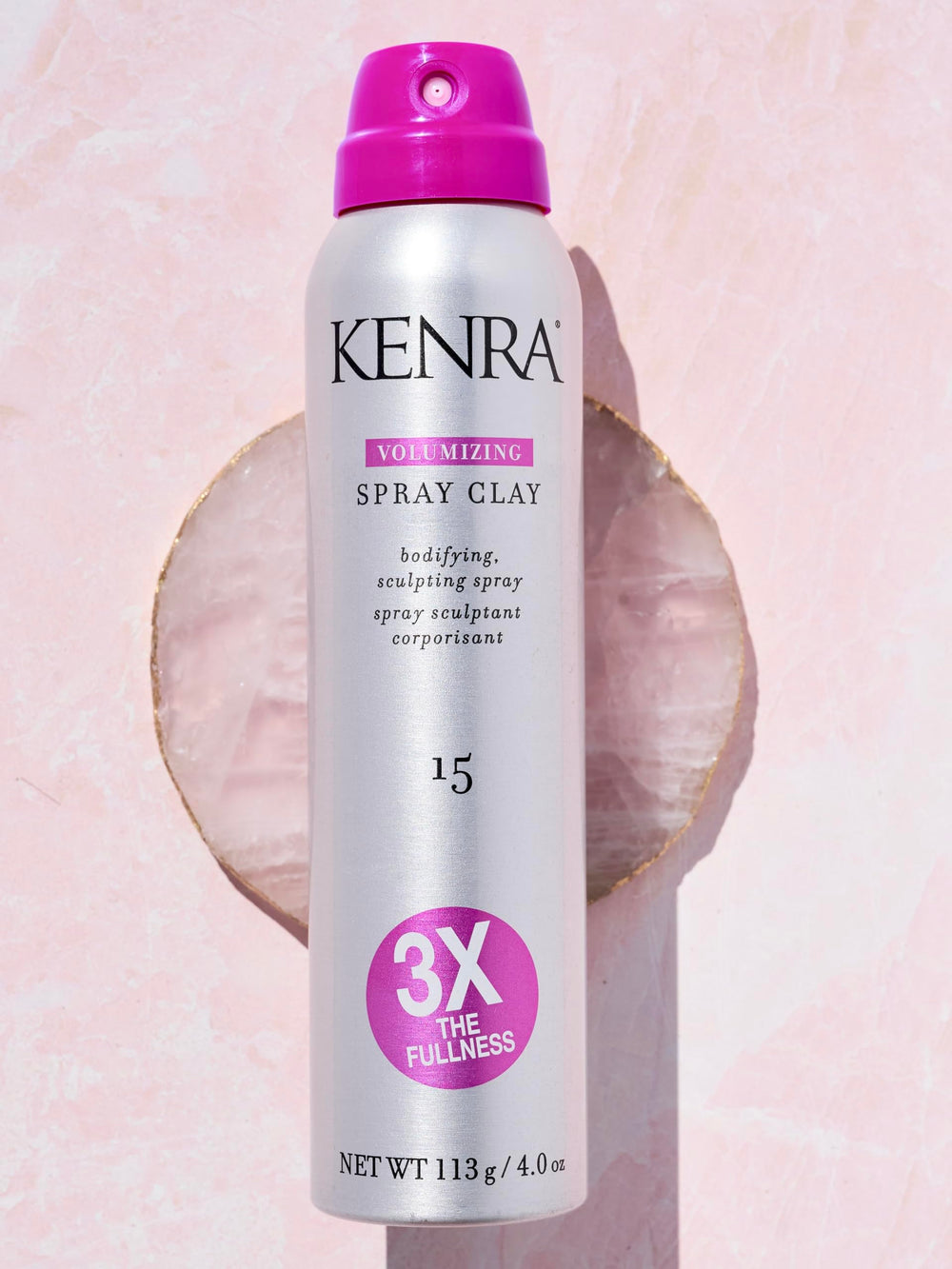 Model with lifted mid-lengths and ends after Kenra spray clay for visible fullness