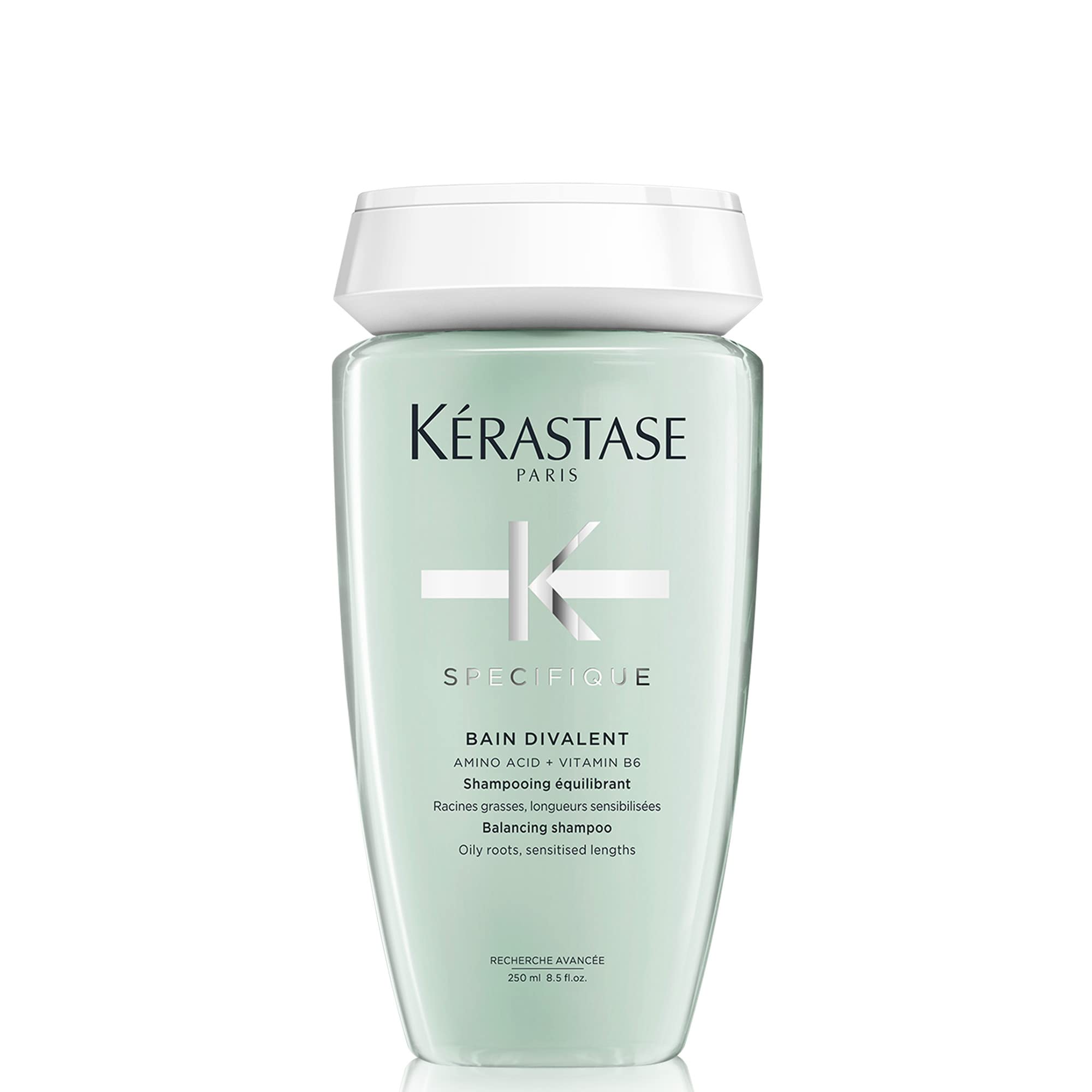 KÉRASTASE front bottle shot showing product packaging and premium benefits