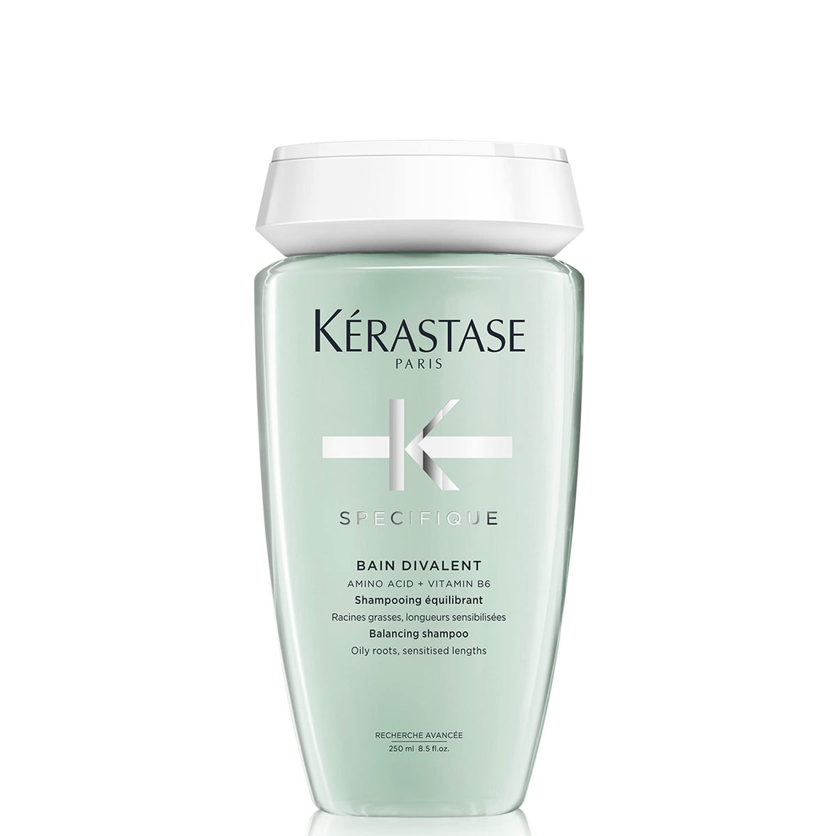 KÉRASTASE front bottle shot showing product packaging and premium benefits