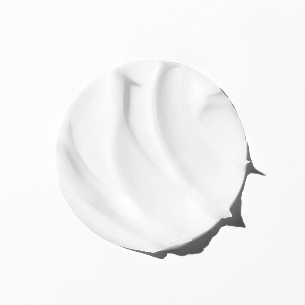 KÉRASTASE hair strand close-up showing smoother polished fiber