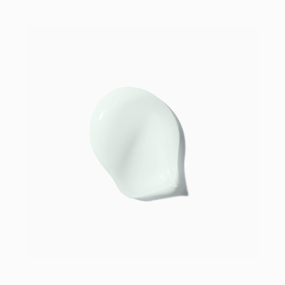 KÉRASTASE bottle staged in bathroom for everyday routine convenience