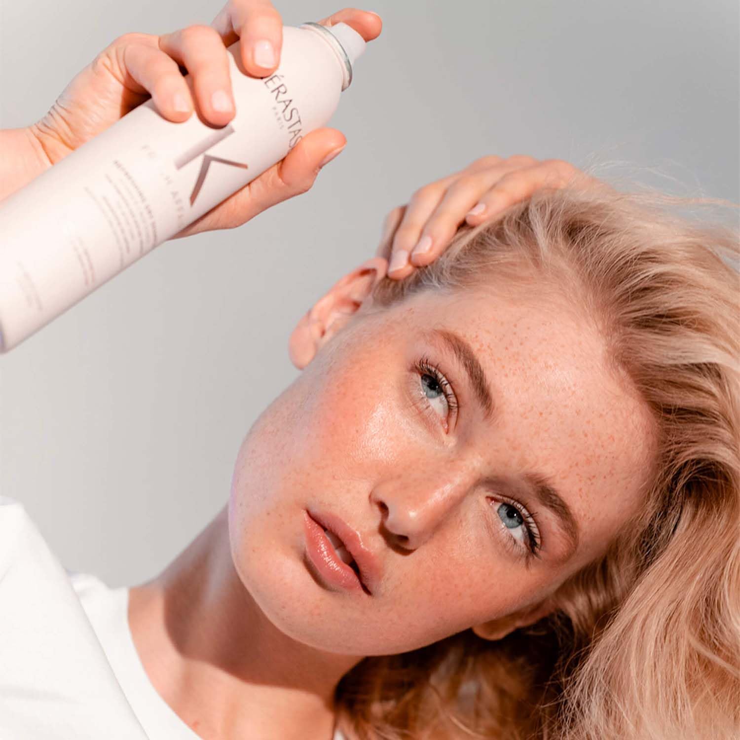 KÉRASTASE ingredient panel with Vitamin E focus, indicating conditioning benefits