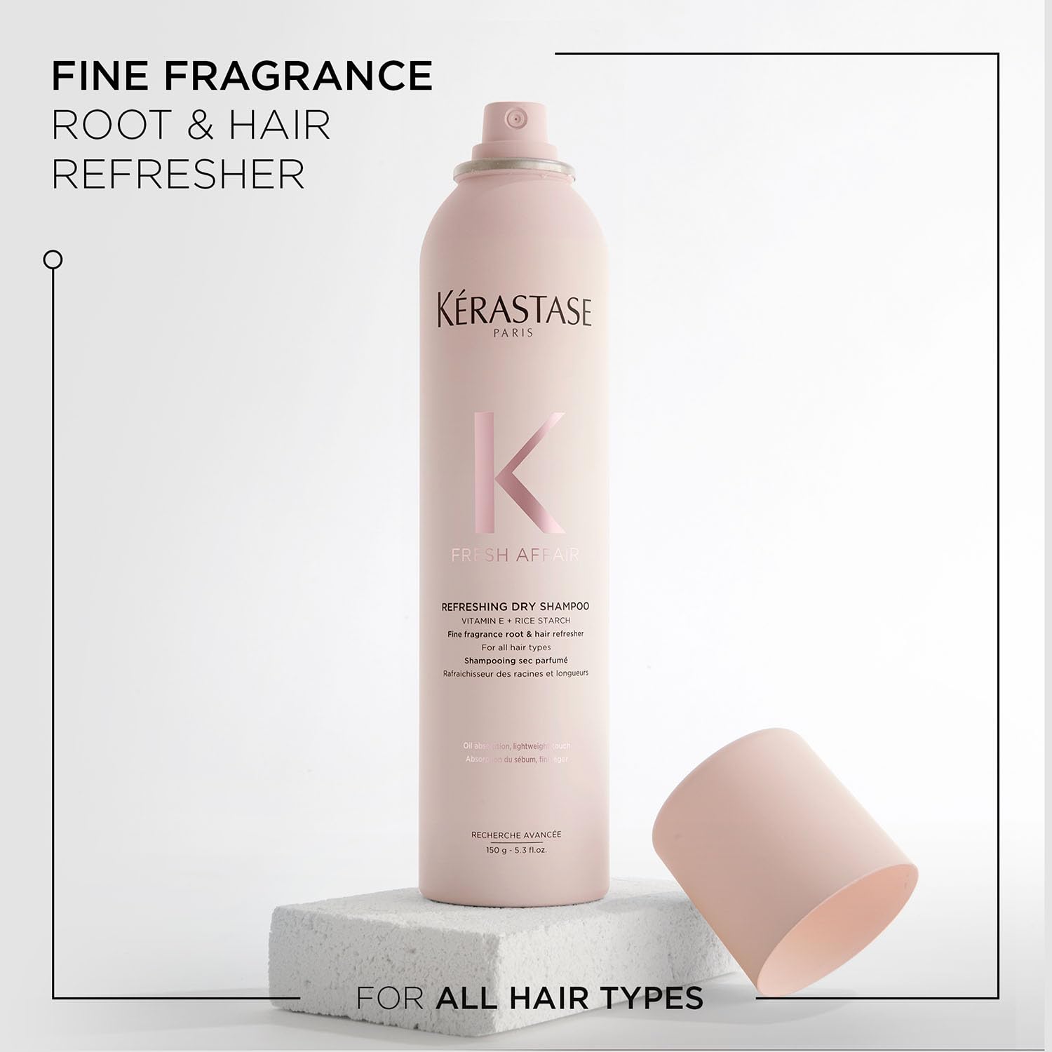KÉRASTASE can styled on a bathroom shelf, suggesting daily luxury routine placement
