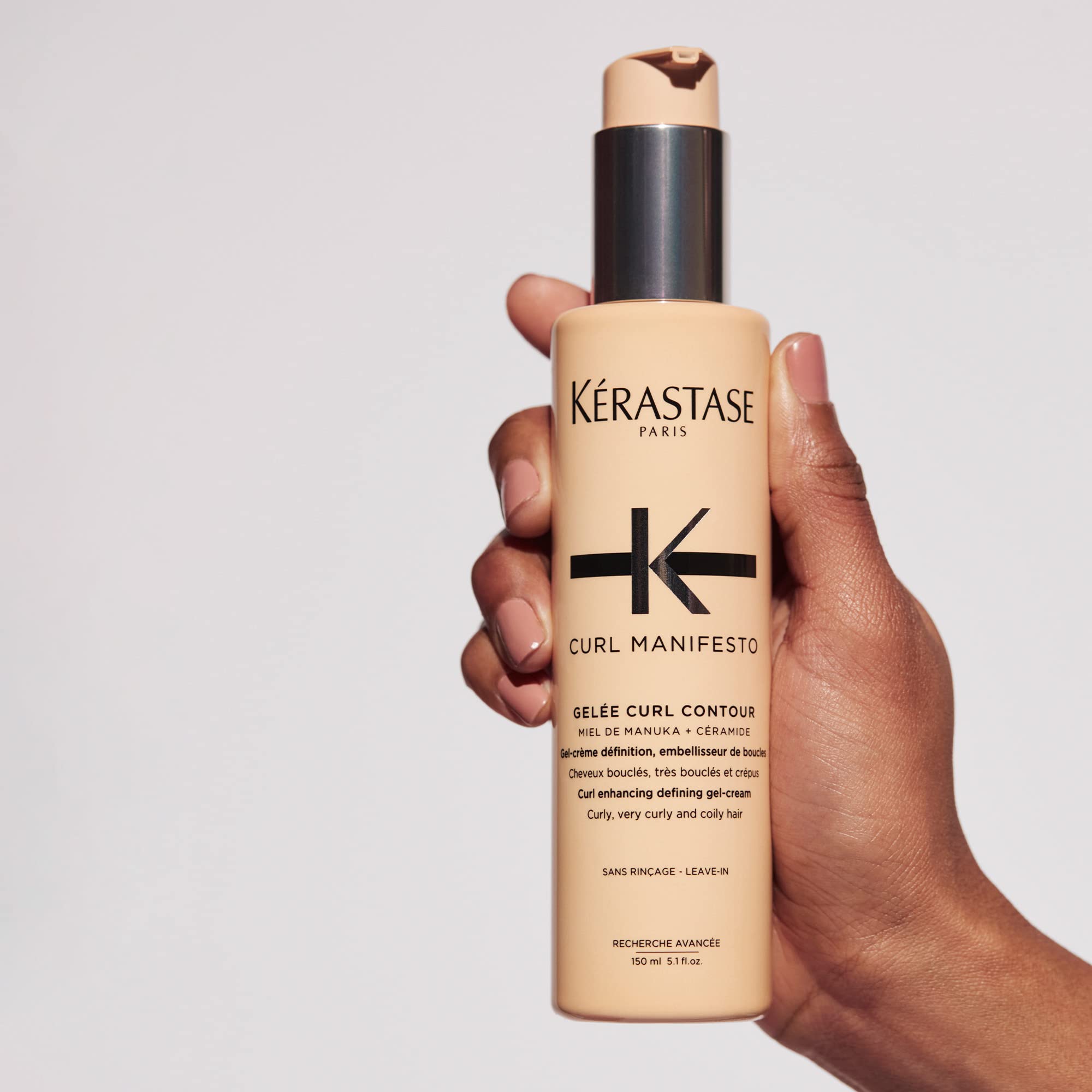 KÉRASTASE product staged in bathroom showing daily styling convenience