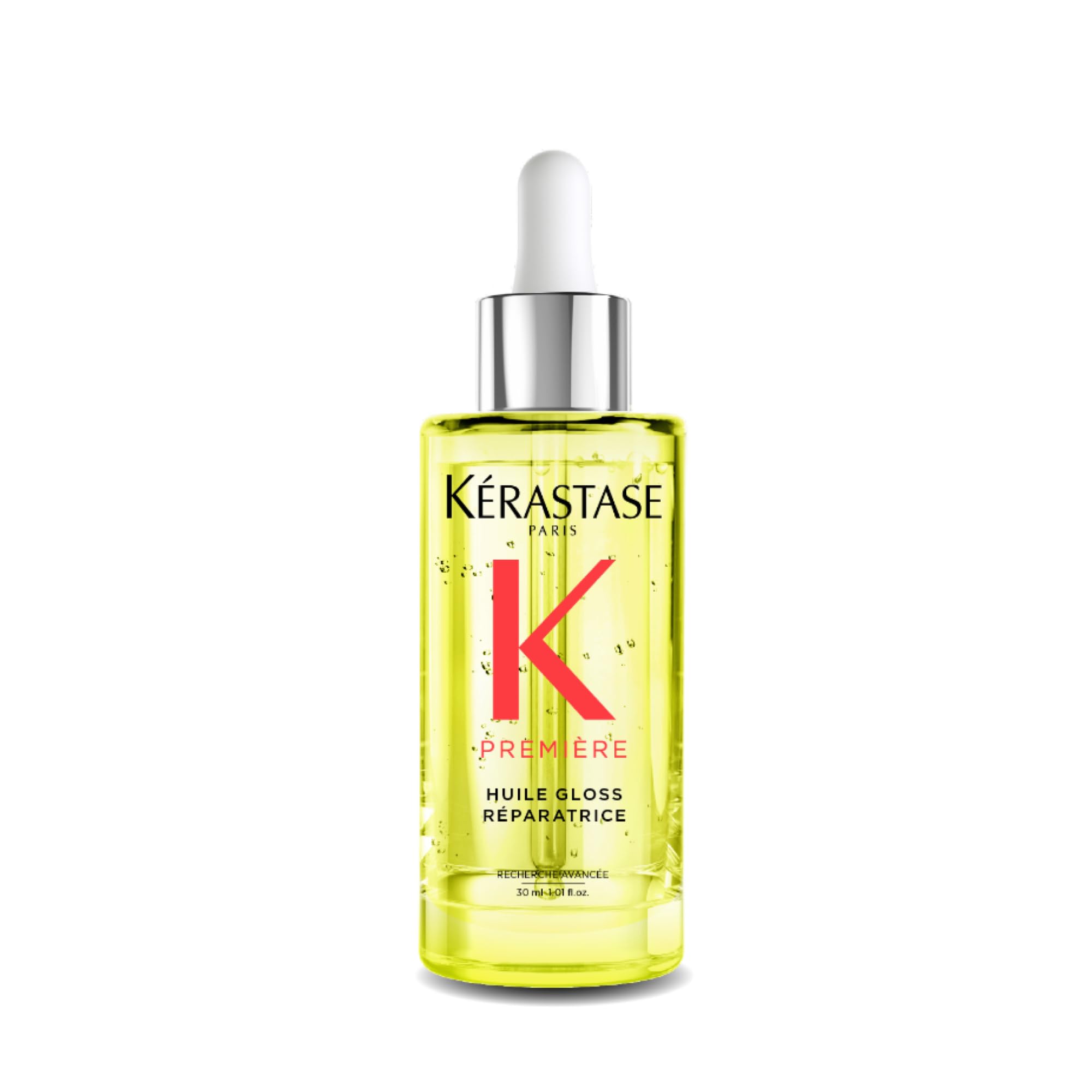 KÉRASTASE front bottle shot showing sleek packaging and product benefit