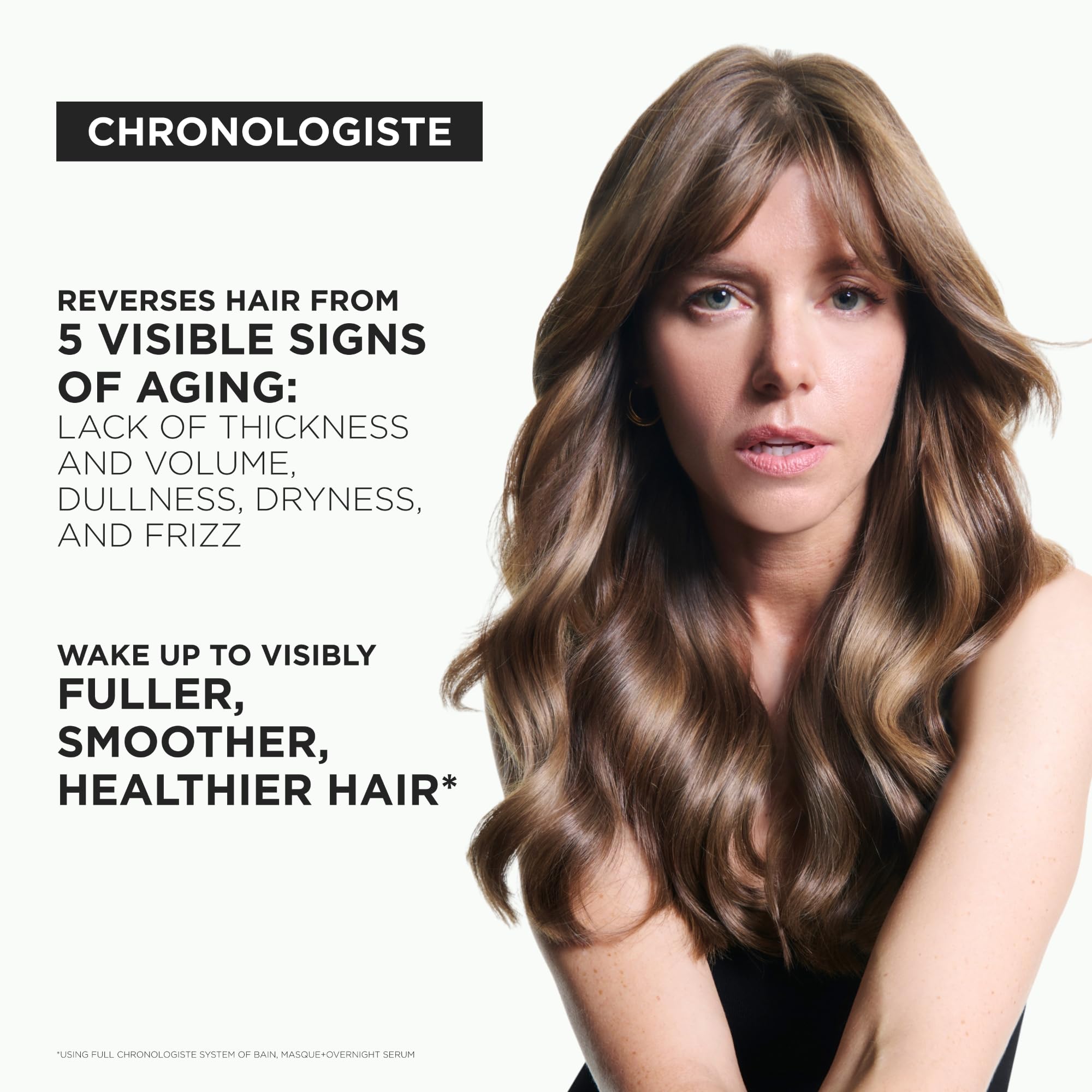 KÉRASTASE shampoo staged in bathroom for a premium at-home treatment vibe
