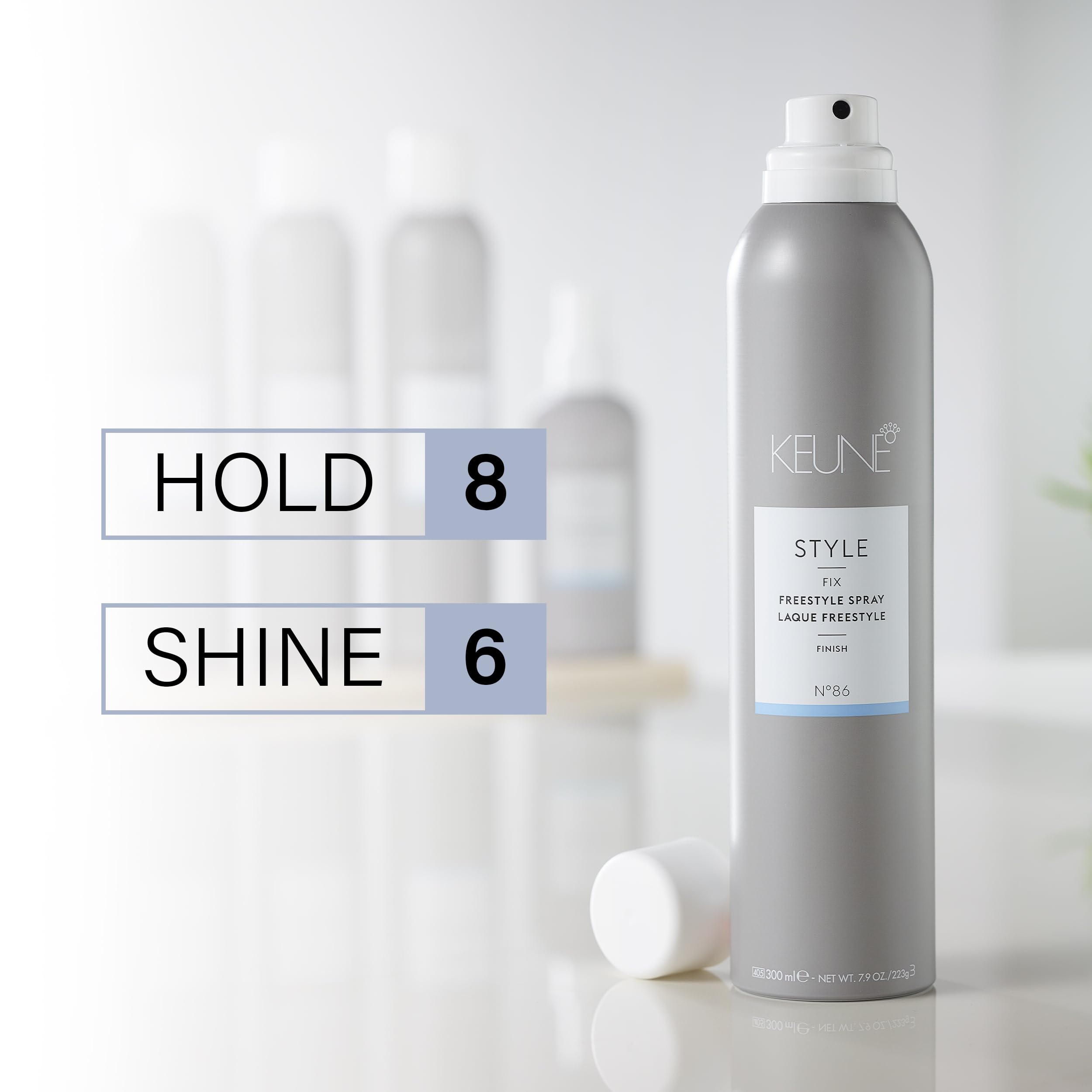 KEUNE mist dispersing through hair to lock style with flexible hold benefit