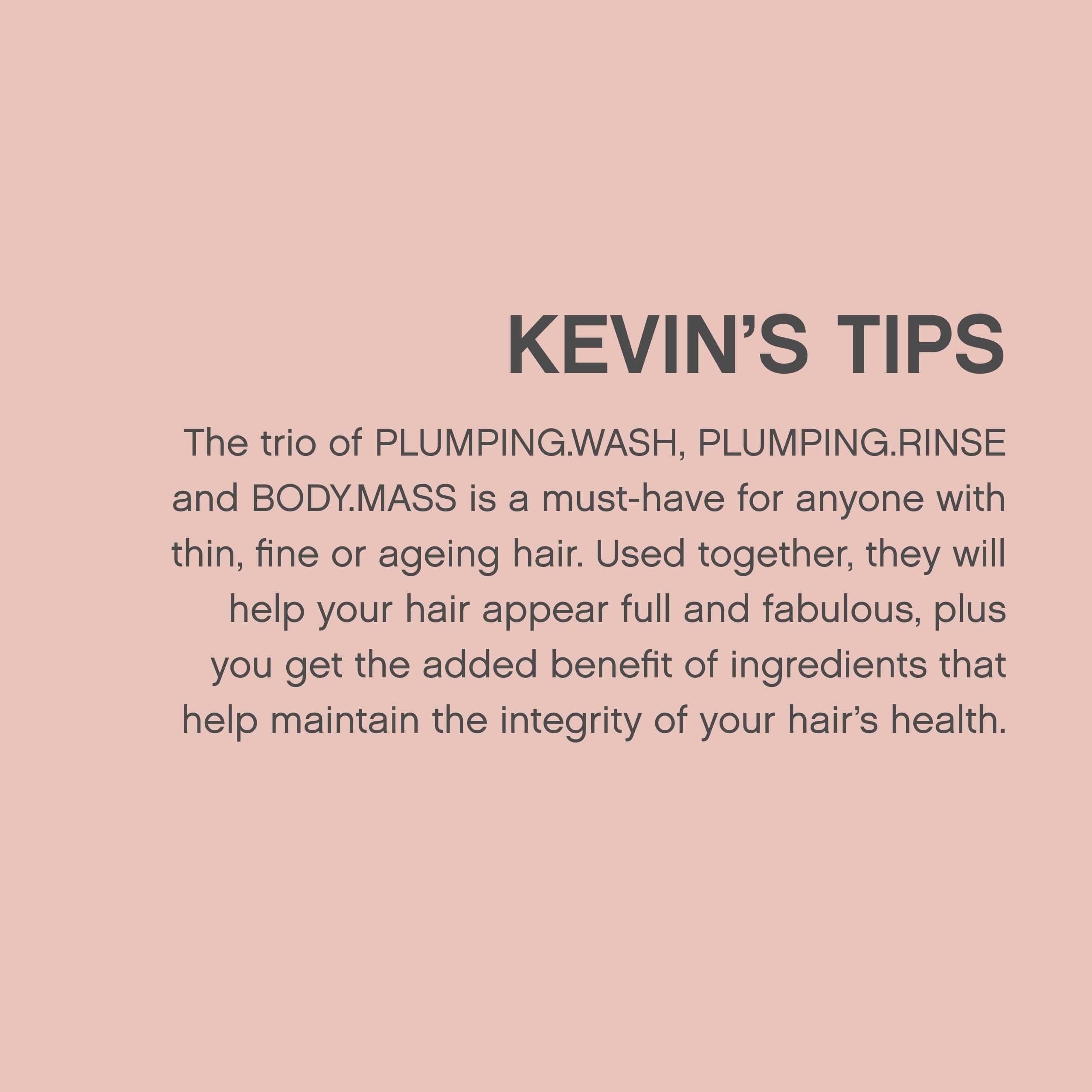 KEVIN.MURPHY 33.8 fl oz bottle held in hand to show large salon-size advantage