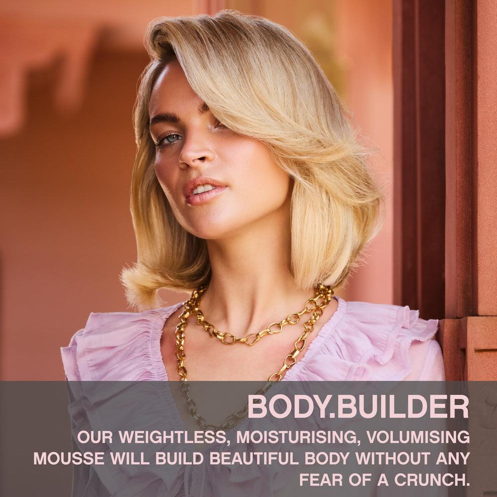 KEVIN.MURPHY mousse foam texture dispensed on hand showing airy, weightless formula for easy even application