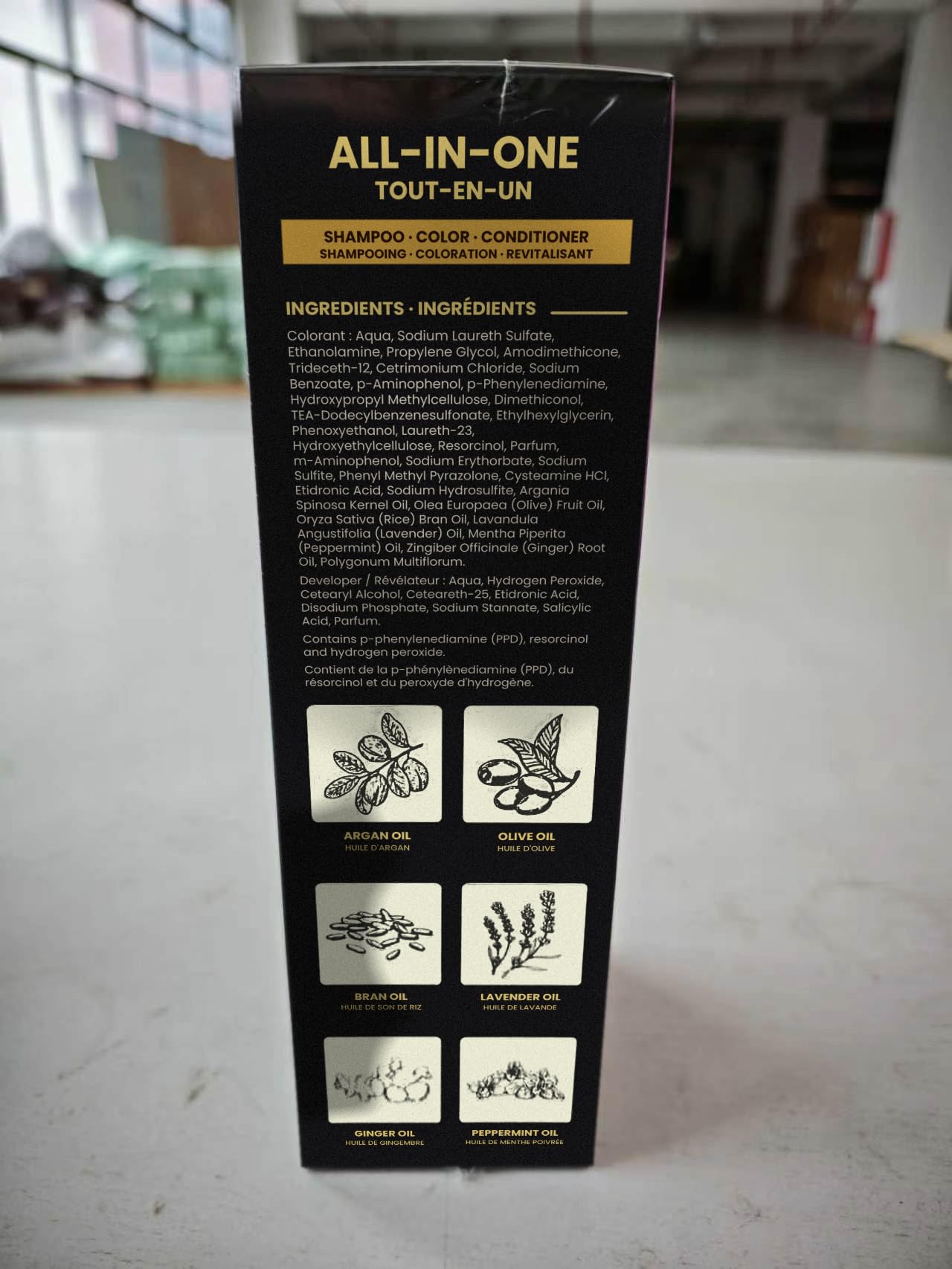 KILOMETS label close-up showing ammonia-free and ingredient claims