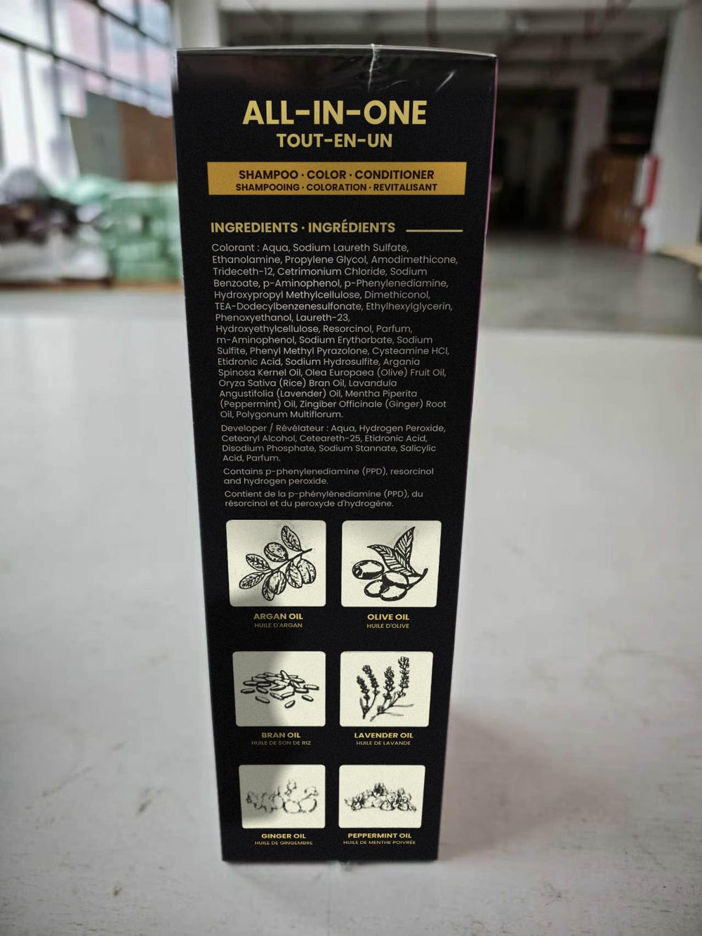KILOMETS label close-up showing ammonia-free and ingredient claims