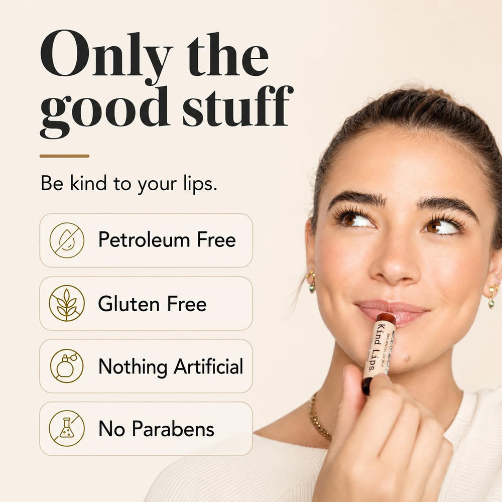 Kind Lips tube held in hand to show scale and portability, convenient for pockets and travel