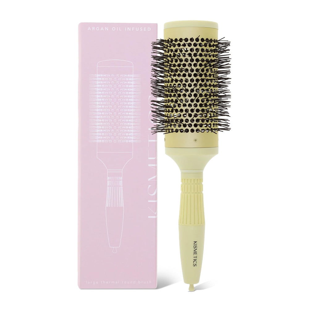 KISMETICS brush front view showing olive green barrel and ergonomic handle for comfortable styling