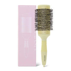 KISMETICS brush front view showing olive green barrel and ergonomic handle for comfortable styling