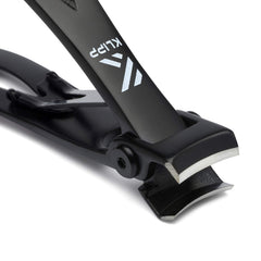 KLIPP curved stainless steel blades close-up showing precision and cleaner cuts