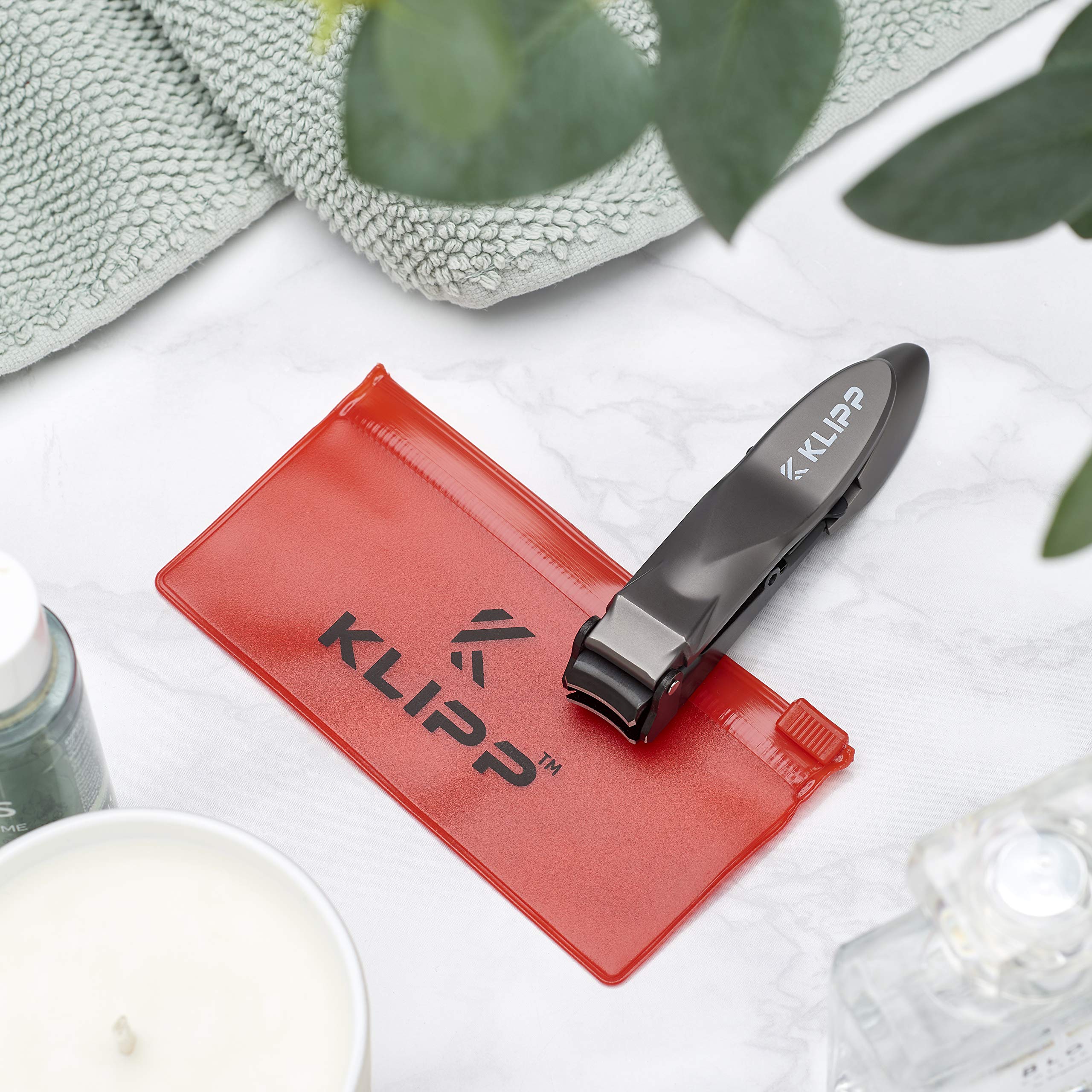 KLIPP held in hand to show compact size and easy control