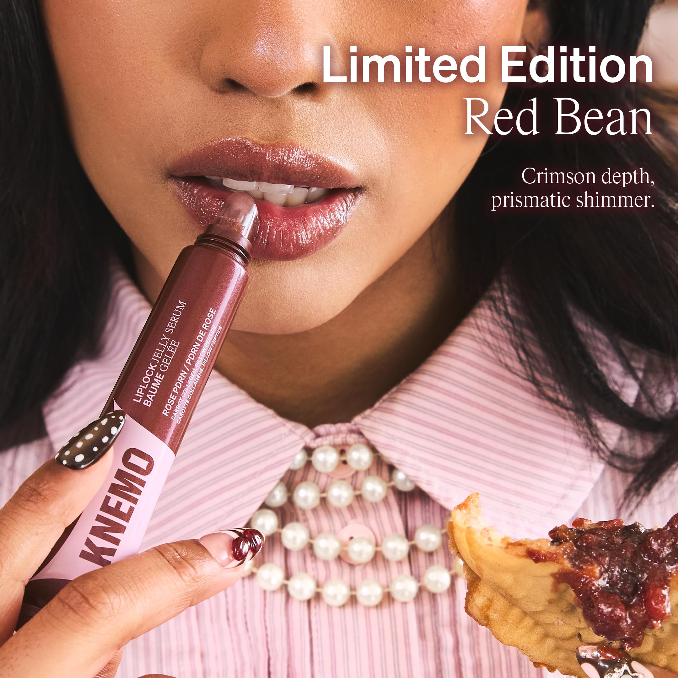 KNEMO LipLock worn on lips in daylight displaying red-brown tint and shine